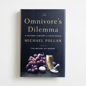 The Omnivore's Dilemma: A Natural History of Four Meals (Hardcover) by Michael Pollan, Penguin, Hardcover w. Dust Jacket from A GOOD USED BOOK.  2006 29th Printing Reference 